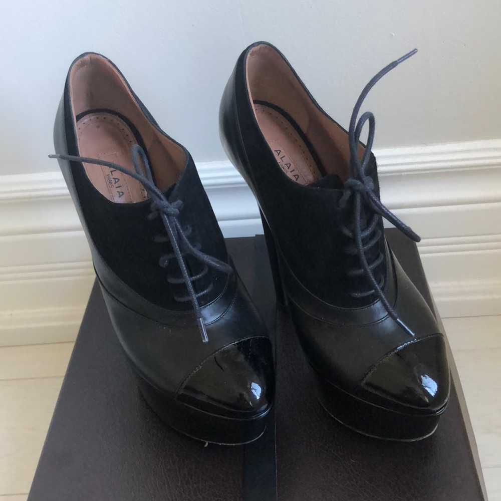 Alaia patent leather lace up ankle bootie